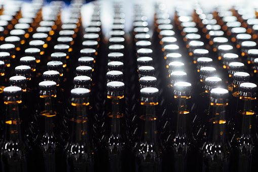 Numerous bottles of artisanal beer
